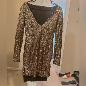 Gold glitter sparkly long sleeve dress.